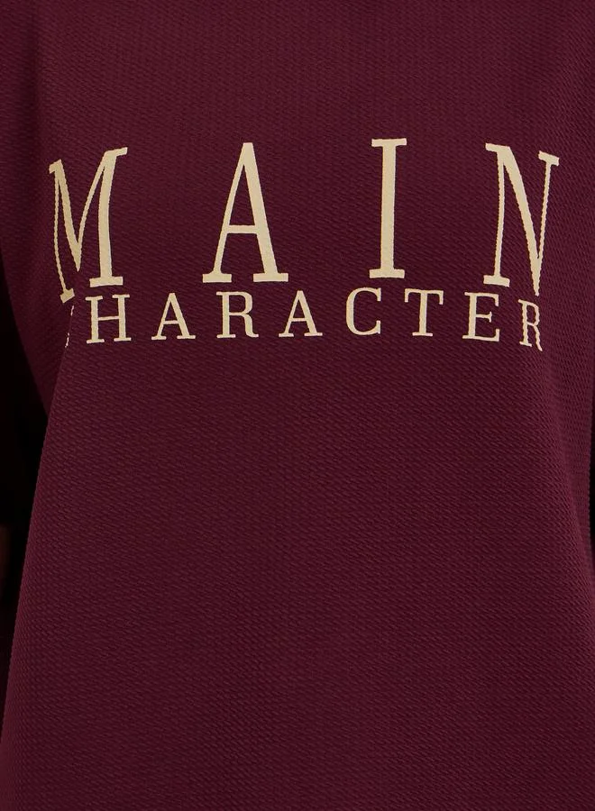 Styli Women Burgundy Slogan Oversized T-Shirt